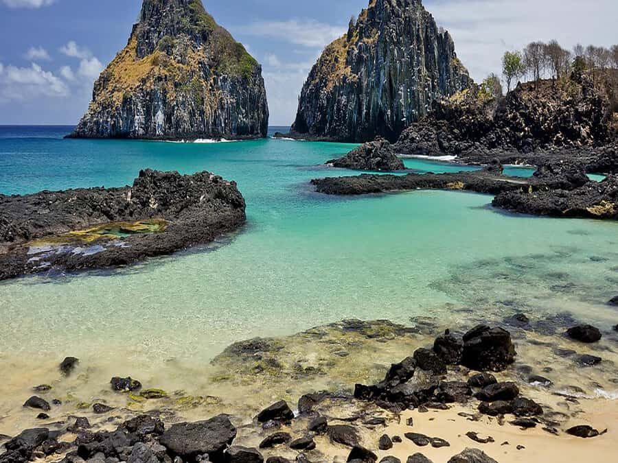 Explore Fernando de Noronha: 7-Hour Ilhatour - Baía dos Porcos and the coastline that feels untouched