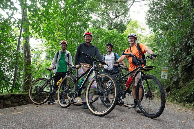Rio Rainforest Ride An Unforgettable Mountain Bike Tour - Stop in Cosme Velho: Old Rio Stories Before the Climb